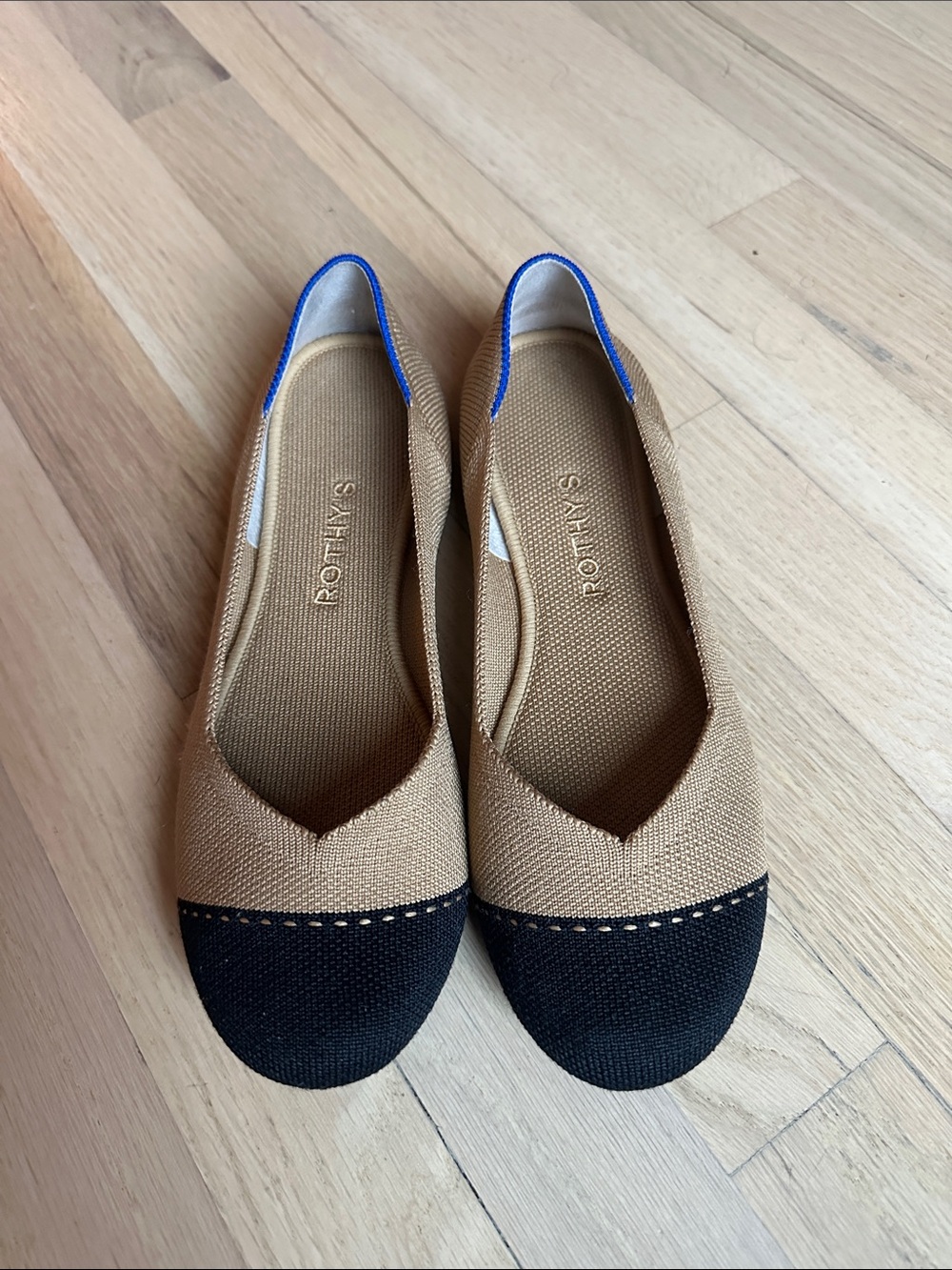 Rothy's Tan Ballet Flats with Black Cap Toe and Blue Heel Trim